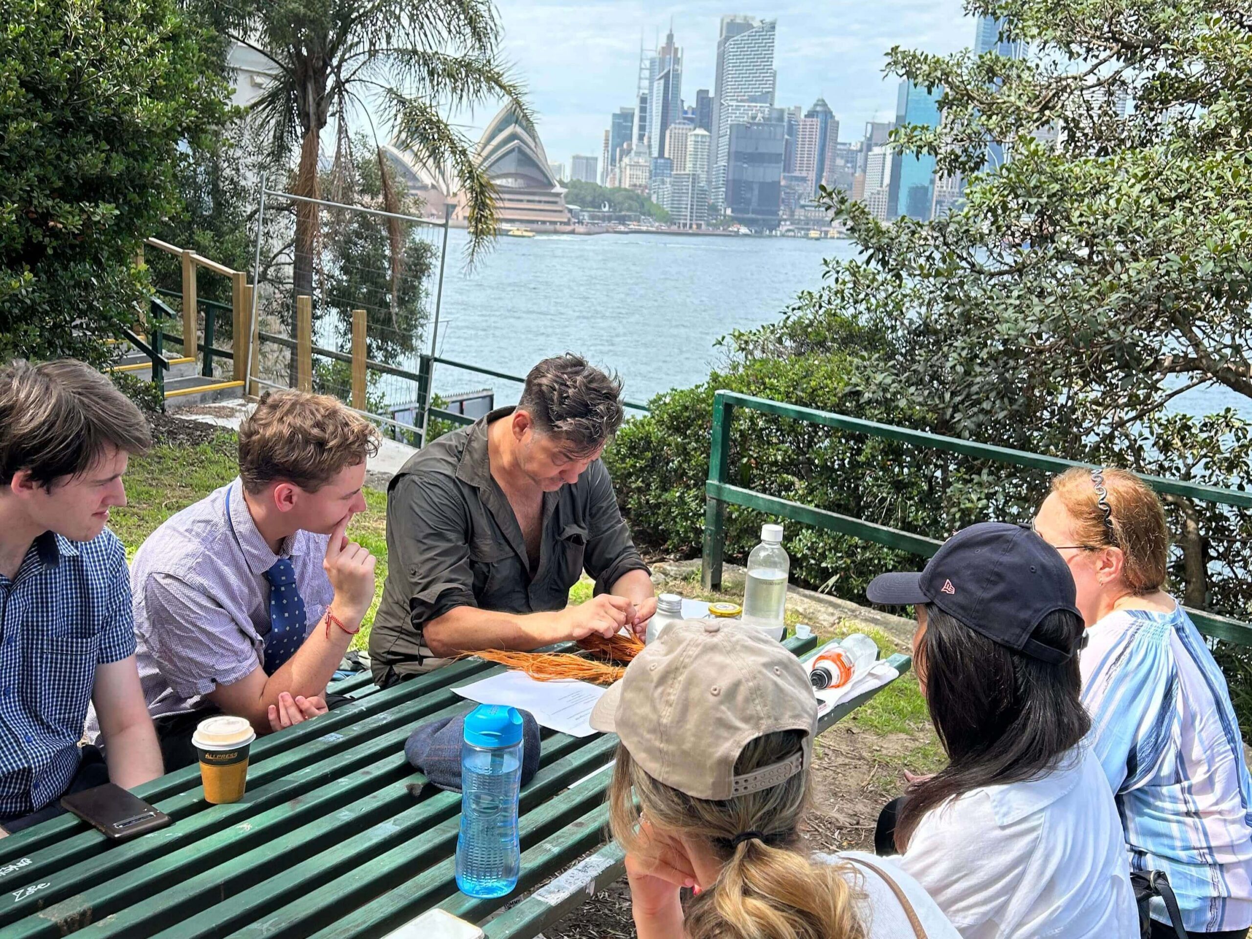Lance Brooks and Rebecca Hansson learn how to make friendship bracelets with stringybark.