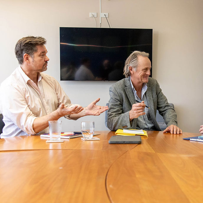BROOKS facilitating a mediation between two parties.